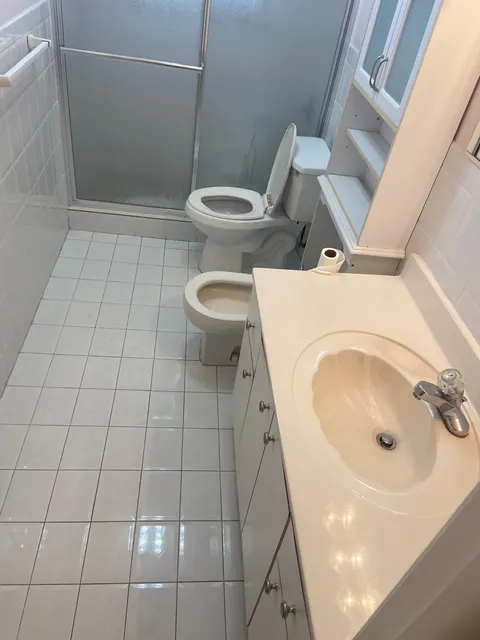 Full bathroom with shower vanity and mirror spotless